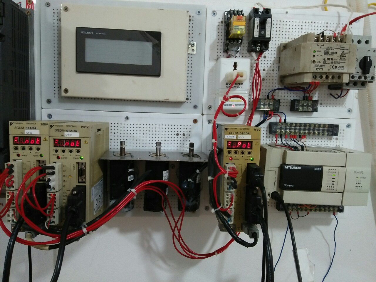 A person working on a computerDescription automatically generated with medium confidence